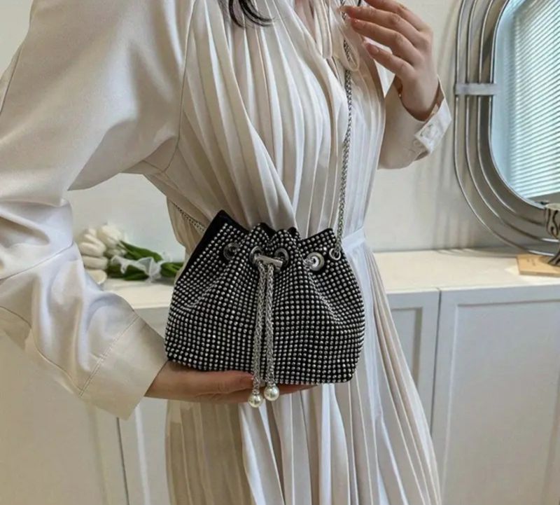 Skinnende håndveske